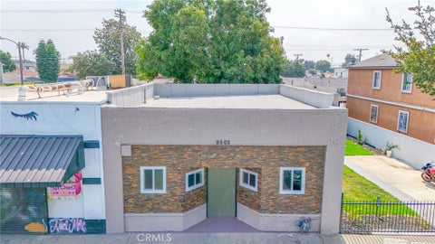 Photo of 9502 S Main ST, Los Angeles, CA 90003 (MLS # DW26121973)