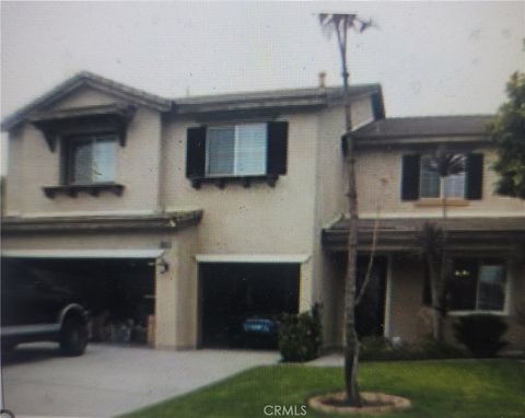 Photo of 13818 Champion Way, Eastvale, CA 92880 (MLS # CV26047359)