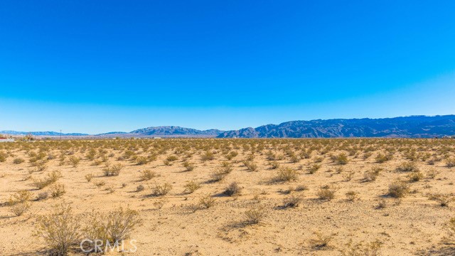 Build your vision from the ground up on this expansive 1-acre buildable lot, perfectly situated in an open area with breathtaking sky and landscape views. This property offers the ideal balance of tranquility and convenience - with easy access to nearby shopping, dining, and entertainment, while savoring the peaceful ambiance of wide-open space. Whether you're envisioning a modern retreat or a cozy homestead, this location makes it all possible, with amazing panoramic views and exceptional value in a highly desirable area. Utilities nearby and ready for your vision to take shape.