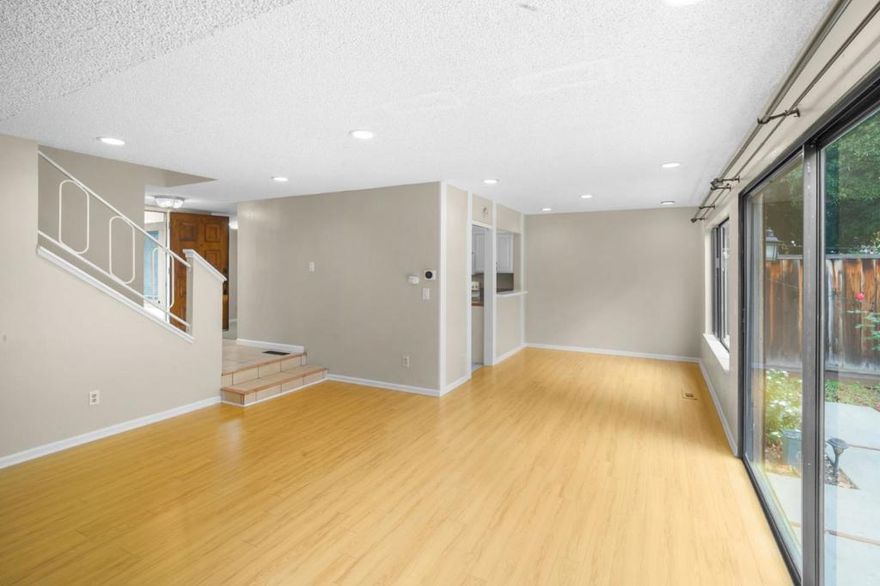 This spacious and charming 3 bedroom, 2.5 bath townhouse has been thoughtfully updated throughout. Enjoy newly installed laminate flooring, recessed lighting in the downstairs living areas, freshly painted interior walls, and new window coverings. The cozy living room features a gas-burning fireplace, while the kitchen is equipped with freshly painted cabinets, tile flooring, a breakfast bar, and elegant granite countertops. Bathrooms have been updated with marble countertops and new medicine cabinets. The property comes fully equipped with all appliances, including a brand-new refrigerator; a separate dining room overlooks the private patio/backyard, and the attached 2-car garage offers added convenience. The community provides ample guest parking along with desirable amenities such as a pool, clubhouse, tennis court, play ground, and access to nearby walking paths and trails. No Smoking on the Property.