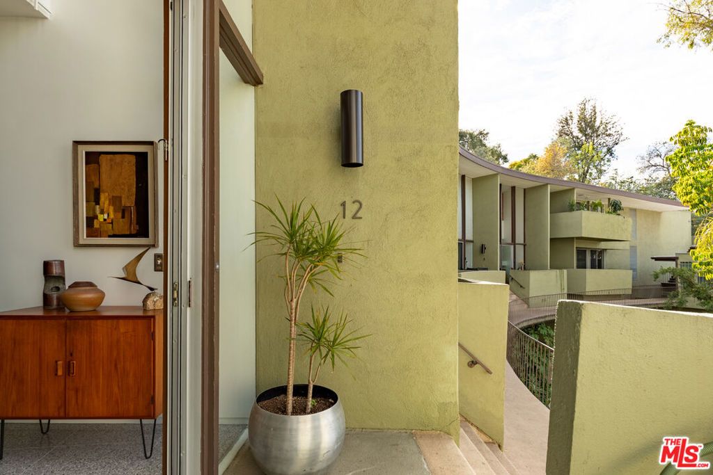 Photo of 3625 Fredonia Drive #12, Los Angeles, CA 90068 (MLS # 25587877)