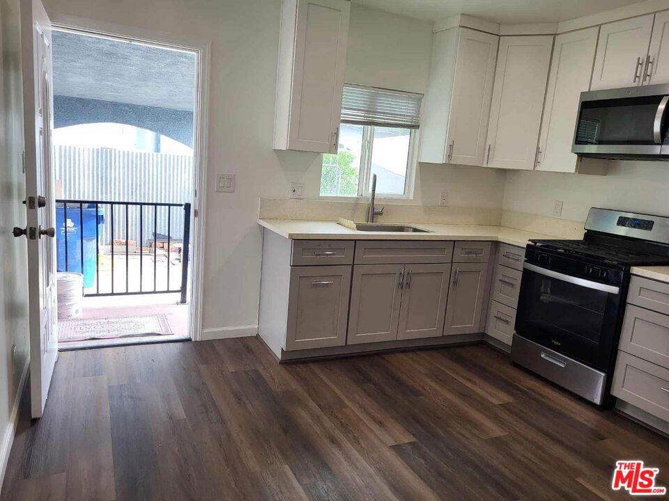 Updated & remodeled 1-bedroom 2-bathroom fully equipped with all appliances, Central heat/AC, all new! From water heater to floors. Open, bright, and airy. Totally updated, including, but not limited to, electrical, plumber, Central AC, washer heater appliances, windows, kitchens, baths - close to eateries, stores, services, and freeways. This is a rear house rental.