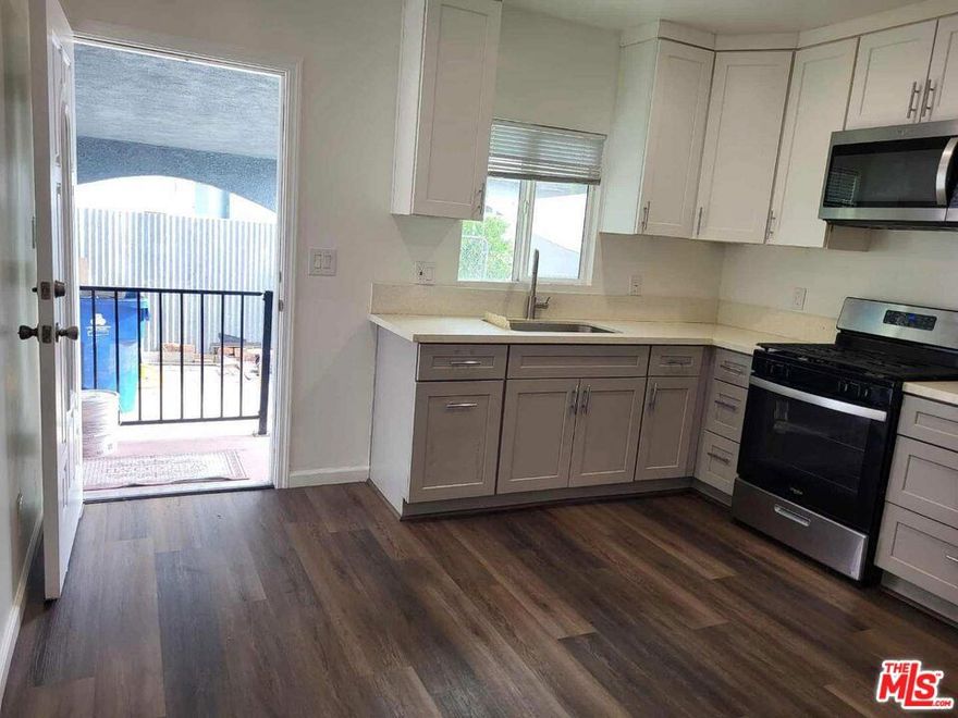 Updated & remodeled 1-bedroom 2-bathroom fully equipped with all appliances, Central heat/AC, all new! From water heater to floors. Open, bright, and airy. Totally updated, including, but not limited to, electrical, plumber, Central AC, washer heater appliances, windows, kitchens, baths - close to eateries, stores, services, and freeways. This is a rear house rental.