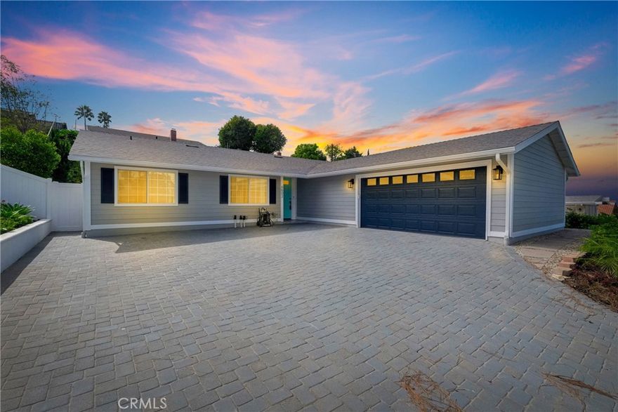 Beautifully Remodeled Single-Level Rancho Palos Verdes Home at the Top of the Hill!

This stunning open-concept ranch-style residence perfectly blends comfort, style, and function. Featuring 3 spacious bedrooms—including a master suite—and a versatile bonus room ideal as an office or 4th bedroom. The home showcases vaulted, beamed ceilings and two elegant stone fireplaces that create a warm, inviting atmosphere. The beautifully remodeled kitchen, with its large center island, flows seamlessly into the living room and expansive family room—perfect for gatherings and everyday living. Enjoy modern upgrades throughout, including central AC, a whole-house water filtration system, copper plumbing, remodeled bathrooms, and dual-paned windows. The outdoor space is an entertainer’s dream, offering a lush grassy backyard, built-in BBQ area, jacuzzi spa, landscape lighting, and steps leading to an upper terrace with ocean views. Additional highlights include a new roof, new paint, upgraded electrical, attic fan, paver-lined driveway, new garage door with direct house access, and a dedicated indoor laundry room. From the street, you can enjoy cool ocean breezes and glimpses of the Pacific. Conveniently located near great shopping, dining, hiking trails, and award-winning schools—this turn-key Rancho Palos Verdes gem offers the very best of coastal living!
