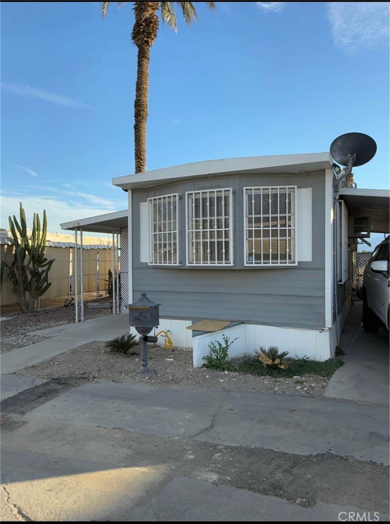 Updated & Move-In Ready in 55+ Community!
Welcome to this charming and fully renovated 2-bedroom, 1-bath manufactured home located in a quiet and well-maintained 55+ community in Indio
The exterior features fresh paint, secure window bars, and desert landscaping for low maintenance living. Step inside to a beautifully upgraded interior with new vinyl plank flooring, modern white shaker cabinetry, stone-look countertops, and stainless steel appliances including a gas stove and double-door refrigerator.
The open-concept layout maximizes space and natural light, creating a comfortable and stylish living environment. Covered parking is included, with a private side yard area and minimal upkeep required.
Conveniently located off Hwy 111, you’re close to shopping, dining, golf, medical facilities, and all that the Coachella Valley has to offer.
55+ Community | Space Rent Applies | Park Approval Required