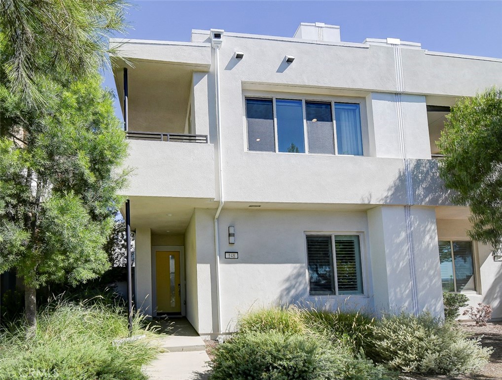 Welcome to this beautifully upgraded 4-bedroom, 3-bath home in the highly desirable Great Park community of Irvine. Designed for both elegance and functionality, this residence offers a bright, open layout with premium finishes throughout.
The main level includes a full bedroom and bathroom, ideal for guests or multigenerational living. The kitchen features a water filtration system and modern appliances, opening to spacious living and dining areas.
Enjoy plantation shutters throughout the home, and custom roller shades adding both style and comfort. The primary suite is bright and inviting, featuring a private balcony with open views and abundant natural light.
The third-level bonus room provides flexible space for a family room, office, or media room and unobstructed views. Additional upgrades include a Ring security system, custom built closet organizers and epoxy flooring in garage. No homes in front, only open views and added privacy.
Residents enjoy access to Great Park’s resort-style amenities, including pools, clubhouses, playgrounds, sports courts, parks, and scenic walking trails — all close to top-rated Irvine schools, shopping, and dining. Portola High School and Cadence Park K-8 school are within walking distance.