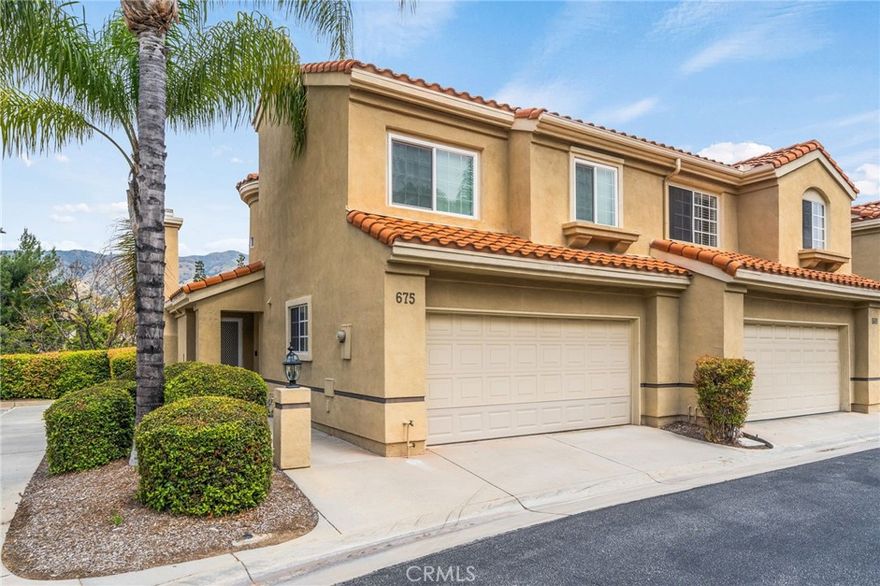 Beautifully updated and maintained three bedrooms, 2.5 bathrooms townhouse located in Wild Rose Condominium Community. Small complex with ample visitor parking, gated community pool, and close to schools. Formal living room with fireplace, hardwood floors, and French doors to outside patio, updated kitchen with granite counters, and stainless appliances including gas range, dishwasher, and dining room area with door to outside patio. Downstairs powder room with quartz counters. Upstairs features a primary suite with balcony and two closets and a primary bathroom with soaking bathtub/shower and vanity with quartz counter. Two additional upstairs bedrooms, and a hallway bathroom with large shower. Two car attached garage with direct access into house and laundry hookups with washer and dryer. (No warranty by Landlord).  Located in San Dimas with Glendora Schools (tenant to verify with City).