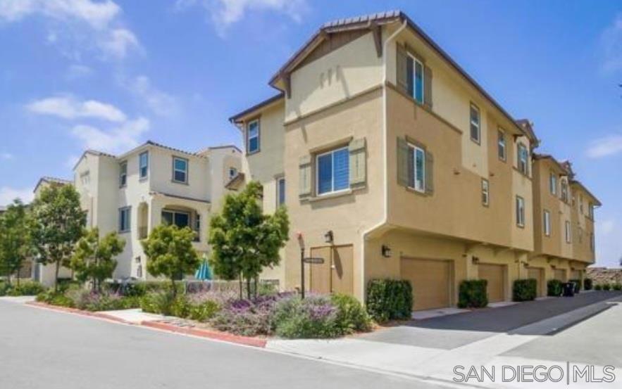 Located in the desirable Vista Del Sur community. Built in 2019, this contemporary residence features an open floorplan with high ceilings and luxury vinyl plank flooring throughout. The townhome features a kitchen with granite countertops and stainless steel appliances, a private patio, a primary suite with a walk-in closet, two additional bedrooms, a laundry room, and an attached 2-car garage. The Vista Del Sur community offers amenities like a pool, spa, playgrounds, and a clubhouse. The location provides convenient access to freeways (905, 5, and 805) and is close to shopping, dining, schools, and Naval Base San Diego.