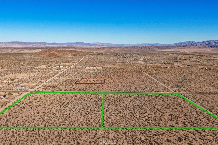 Two Large Acres located on paved Border Ave are being sold together for a total of 12.68 Acres at an amazing price! Joshua Tree is still everyone's desired placed to be. Here is an opportunity to own sizable acreage between two streets with power and water in the streets nearby. Paved access is always a plus! Don't let this deal pass you by! Call an Agent today! Parcels are #'s: 0631-143-27-0000 & 0631-143-28-0000