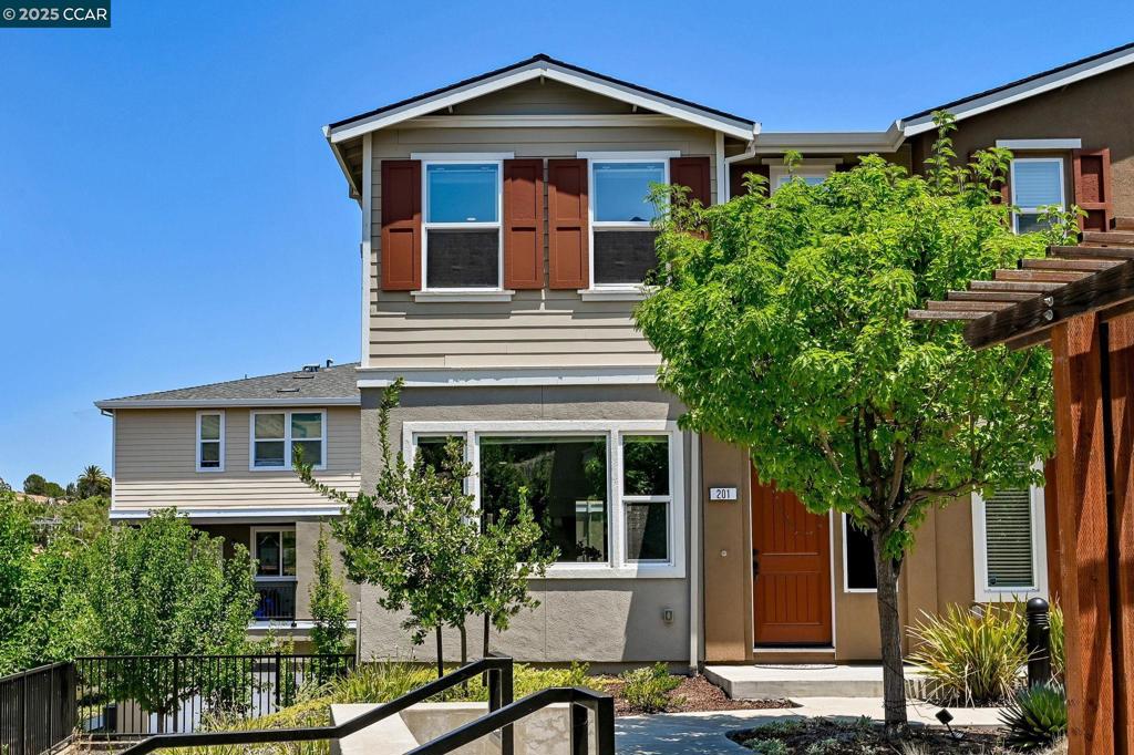 GREAT PRICE! SINGLE FAMILY HOME FEEL! Exceptional end-unit where natural light, thoughtful design, and modern comfort and luxurious amenities come together perfectly! With 4 bedrooms and 3.5 bathrooms and over 1800 square feet, this spacious condo/townhome has the feel of a single-family home. Enjoy the open-concept layout featuring a stylish great room and a beautifully equipped chef’s kitchen perfect for entertaining. Imagine creating culinary delights and sharing memorable meals gathered around the kitchen island. A private balcony invites peaceful moments or evening grilling. The flexible floor plan includes a generous guest suite with a full bath on the lower level, perfect for a home office, guests, or multi-generational living. Unwind in the luxurious primary retreat with a double vanity and walk-in shower and oversized walk-in closet. Two additional secondary bedrooms are spacious and well-appointed. Convenient upper-level laundry room. Tankless water heater. Fully finished attached 2 car garage. Nestled in the Villages at Arnold with serene views of Mt. Diablo, the home is moments from parks, highly-rated Mount Diablo schools, freeways, BART, and the vibrant Martinez Downtown and Waterfront—offering the very best of modern suburban living.