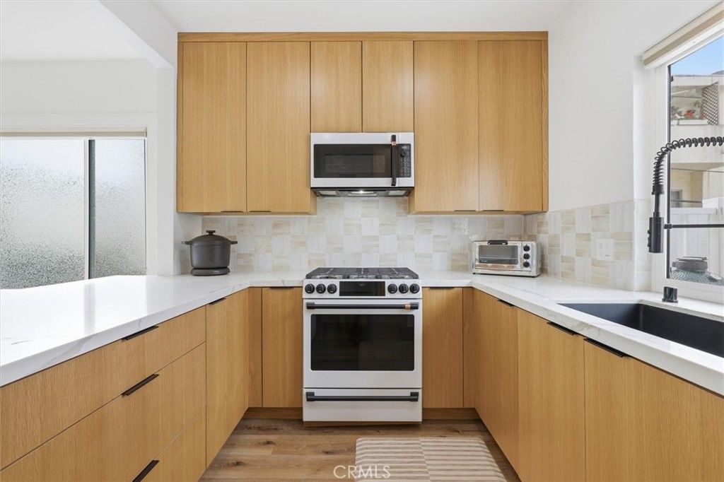 Photo of 11936 Gorham Ave, Los Angeles, CA 90049 (MLS # SB26081026)