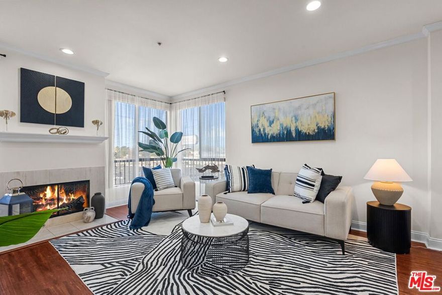 Highly desirable 2 bd/2 bath penthouse corner unit on the top floor of the beautiful Laurel Bliss building. The unit was freshly painted in 2025 and recently renovated, complete with newer bathrooms and designer type appliances, including a jet operated soak tub in the primary bathroom. With a spacious modern open floor plan, high ceilings, vinyl flooring, and ample natural lighting throughout, this home is the very definition of charm and luxury.The unit also features a washer and dryer inside of a large pantry closet with ample storage. The newly renovated kitchen has modern cabinets and stainless-steel appliances. The primary bedroom features a spacious closet and a nook with a large window providing incredible views, especially during sunsets!The building has a remote accessed garage (2 tandem parking spot availability plus guest parking). There are open-air corridors throughout the building that surround a serene courtyard, where you can enjoy BBQ by the recreation room or head up to the rooftop for amazing views of the Valley and front row seats to 4th of July fireworks! The lobby of the building also has a gym. The HOA included in the rent covers trash, hot water and sewage.Don't miss this opportunity to live in a warm and inviting home right in the center of North Hollywood, only minutes away from the NoHo West shopping and entertainment complex, amazing restaurants and grocery stores, coffee shops, theaters, and parks. The building is very conveniently located with access to the 101 and 170 freeways.