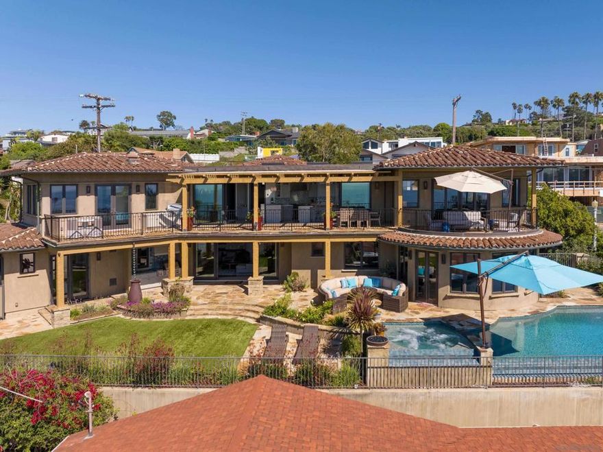 Panoramic Ocean Views in Sunset Cliffs. The attention to detail and careful craftsmanship that went into building this home makes it a one of a kind property. With five bedrooms and two large living areas, this home is comfortable for a large family, and offers plenty of room to entertain. Features include an office with a view, wine cellar, large 3 car garage, full laundry room with 2 washers and dryers, and smart home controls of the pool, lights, security, etc. Blocks to the ocean and just minutes from Downtown, this quiet neighborhood offers a relaxed nature and a convenient location. (View is protected by a height restriction on the property below.)