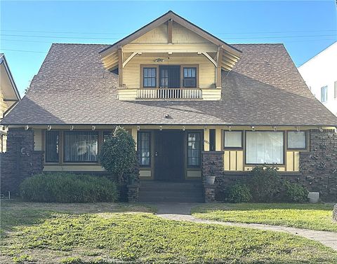 Photo of 4811 S Gramercy Pl, Los Angeles, CA 90062 (MLS # IV25282259)