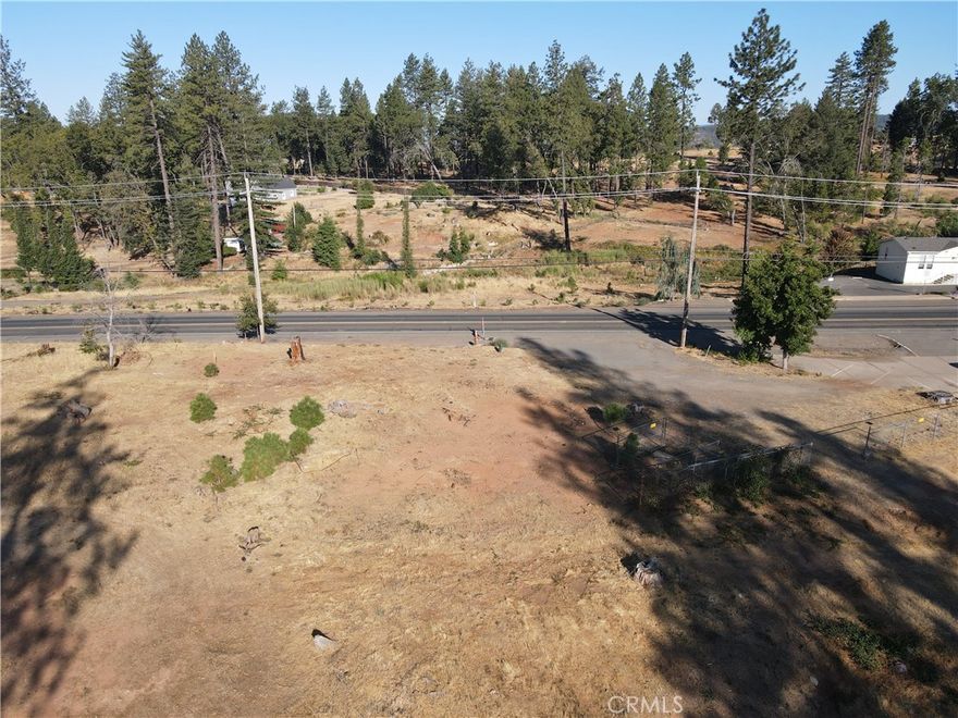 Fantastic 1.14-acre lot with tons of possibilities for investment!!! Survey Complete. Water Active & Backflow Device installed. 163 feet of Prime Skyway Frontage. Zoned CC Community Commercial. Looking for a multi-family investment the CC allows with a Town of Paradise approval and issuance of site plan review. How about building your primary residence and build your business on the same lot? So many options for a new owner under this zoning. To name a few that are permitted; Business offices & services, Consumer Repair, Financial Services, Food Sales, Liquor Sales, Manufacturing (custom), Medical Offices, Pet Services and/or Pet Shop, Professional Offices, Restaurant, Retail Services and Warehouse. There are at least 20 more possibilities with Town of Paradise Approval. Invest in Paradise as this town keeps growing faster than any towns in California. Previously the lot had two single family residences. Septic system was replaced 2010 with a 1500-gallon tank, condition unknown.