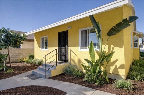 Photo of 841 W 58th St, Los Angeles, CA 90037 (MLS # SB26016973)