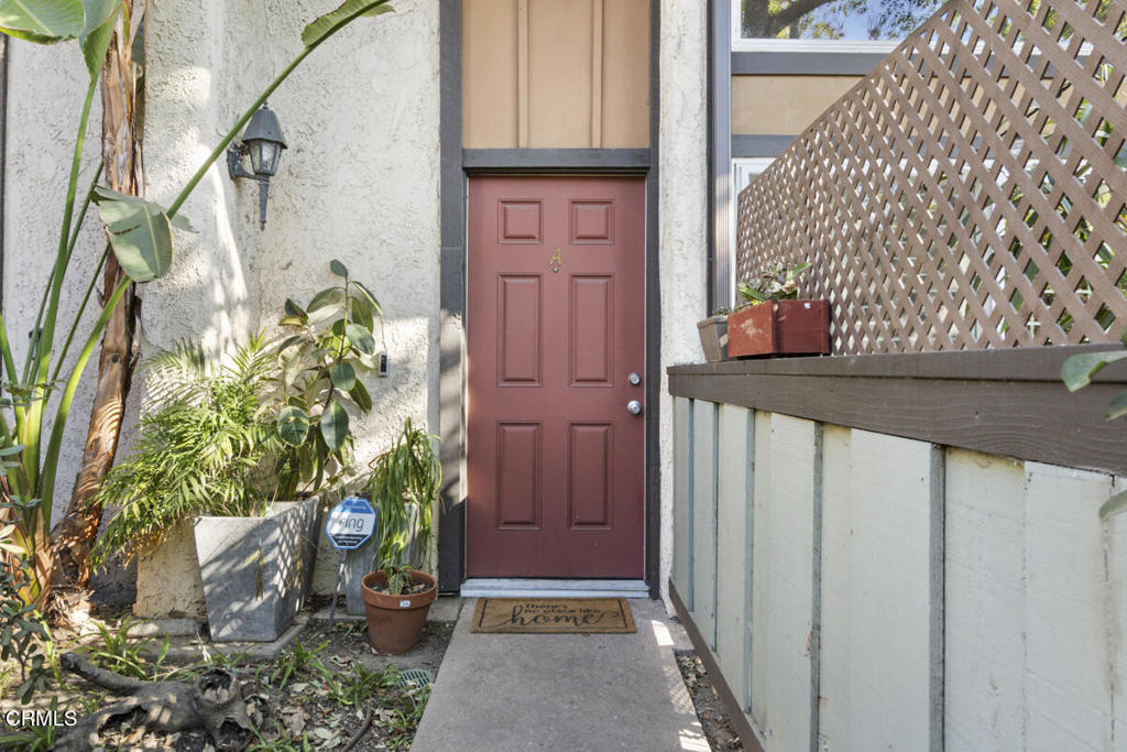 Welcome to your private urban retreat in Van Nuys. This stylish split-level corner end unit blends modern comfort with everyday convenience, offering soaring ceilings, abundant natural light, and a secluded patio shaded by your own beautiful tree. Step inside from your private, gated two-car garage into a spacious main level designed for entertaining, while guests arriving through the lush courtyard are greeted by manicured grounds and an elegant entry. The airy living room features a cozy fireplace and direct patio access for seamless indoor-outdoor living. Upstairs, a versatile loft-style dining area overlooks the living space and connects to an updated kitchen, a refreshed half bath, and a flexible guest room or home office. On the top level, you'll find two peaceful bedrooms, including a generous primary suite with a private balcony, walk-in closet, and beautifully appointed bath--an ideal retreat to start or end your day. This desirable corner unit shares only one wall for enhanced privacy and tranquility. Recent improvements include a new garage door, dual-pane windows, updated electrical components, a newer water heater, fresh interior paint, and a completed soft-story retrofit for added peace of mind. Enjoy resort-style amenities with a low HOA fee, including a sparkling pool, spa, fitness center, and recreation room with a billiard table, plus high-speed internet, water, trash, and recycling. Ideally located near North Hollywood, this home puts Ralphs, Starbucks, In-N-Out, Costco, Home Depot, and countless local dining options within easy reach. This is more than just a home--it's your next chapter waiting to unfold. Don't miss this opportunity--schedule your private tour today!