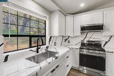 Photo of 125 Sam Lynn Way Way, Oroville, CA 95966 (MLS # 41126239)