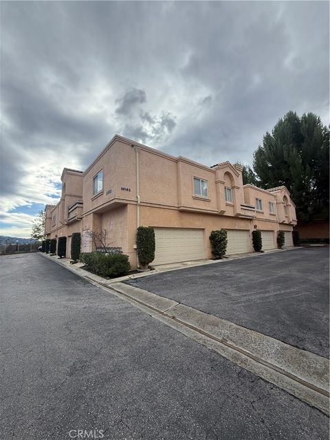 Photo of 25125 Steinbeck Avenue #B, Stevenson Ranch, CA 91381 (MLS # BB25265130)