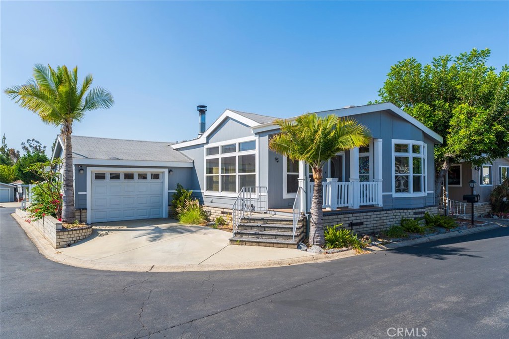 **Welcome to the highly desirable Cedarhill Estates in North Orange County. This charming corner lot home features 3-bedrooms, 2-bathrooms and an attached garage with direct access to both the interior and backyard for added convenience. The interior is light and bright, featuring **abundant windows—30 in total—along with thoughtfully placed skylights** that bring in even more natural light. Recent updates include **new flooring, window blinds, and a brand-new central heating system.** Each room is equipped with a ceiling fan to keep air flowing and maintain comfort year-round.
Enjoy your own outdoor oasis with a **peaceful patio retreat overlooking a tranquil pond**, shaded by a **fruiting white peach tree** and **mature grapevine**, surrounded by a variety of lush plantings. The yard features an efficient **drip irrigation system with automated timers** for both the garden and pond, making maintenance effortless.
Cedarhill Estates is a unique community of 281 individually-owned Manufactured homes where residents enjoy the benefits of Land Ownership (NO LAND LEASE) with low HOA dues of just \$300/month. The HOA offers an exceptional range of amenities including a **large clubhouse with a full kitchen and banquet hall**, perfect for private events and community gatherings hosted by the active social committee. Additional shared spaces include a **billiards room, fitness center, card and craft rooms, and a lending library.**
Outdoors, you’ll find **a swimming pool, spa, sauna, tennis court, half basketball court, and beautifully landscaped grounds featuring two scenic ponds and a waterfall**. Dog owners will appreciate the **pet-friendly environment**, complete with dog waste stations throughout the neighborhood.
** Ideally located near Cal State Fullerton and within the sought-after Troy High School boundary, this home is nestled between three picturesque parks—Tri-City, Craig Park, and Gilman Park—all within walking distance. Come experience the lifestyle at Cedarhill Estates—schedule your tour today!