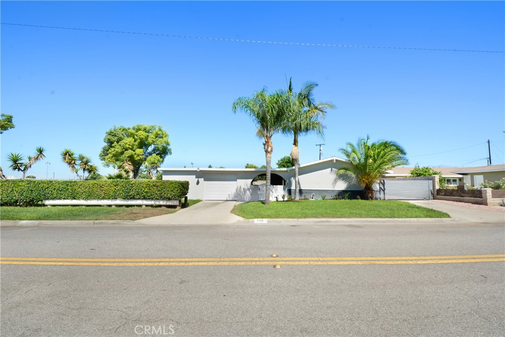 This beautifully renovated 4-bedroom, 2-bathroom home offers modern living in a quiet, established La Puente neighborhood. Thoughtfully updated from top to bottom, the property features energy-efficient windows, upgraded electrical panel. Inside, you'll find brand-new flooring with contemporary baseboards throughout, and new recessed lighting in the main living areas, adding a bright, modern touch to the home's open feel. The kitchen is standout, with quartz countertops, custom cabinetry, and all-new stainless steel appliances. Both bathrooms have been completely remodeled with high-end tile finishes, new fixtures, and frameless glass shower door for a spa-like experience. All bedrooms feature new closet doors, and every fixture in the home has been upgraded with a modern design in mind. Additional highlights new garage door, a new hot water heater, and a new sprinkler system in both the front and back yards for effortless landscaping maintenance.