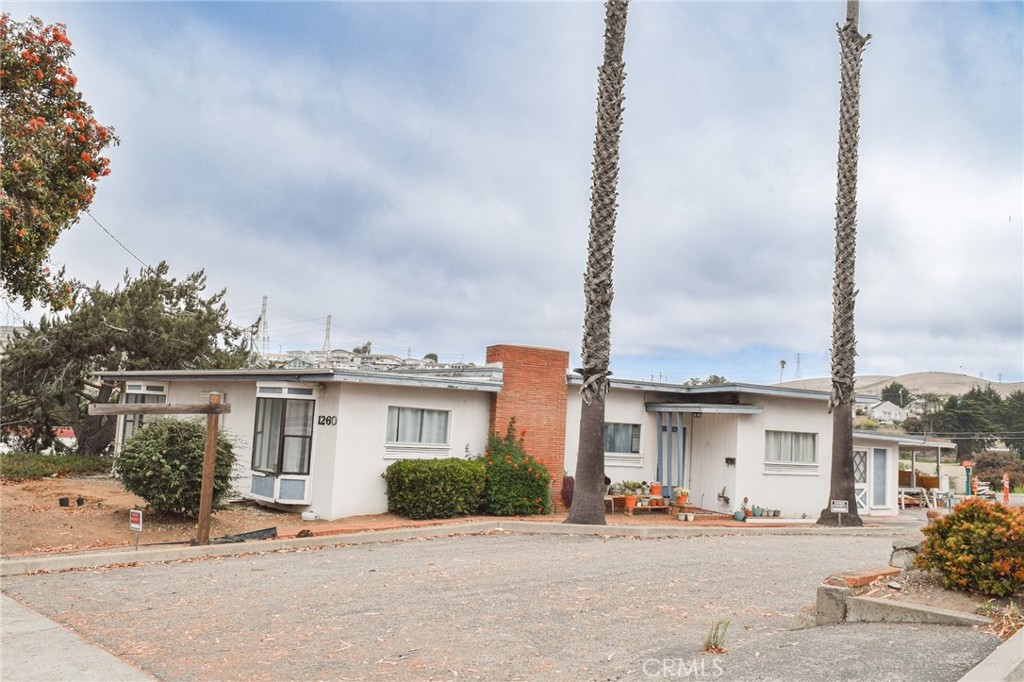Located just steps from Morro Rock and the Embarcadero, 1260 Main Street offers 1,754 SF square feet and endless potential. Located on the main road, this versatile property can serve as a charming coastal getaway, an income producing Airbnb, or a unique storefront. A rare opportunity to own in Morro Bay.