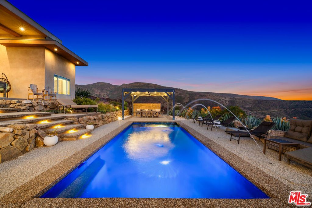 Photo of 10715 Yerba Buena Road, Malibu, CA 90265 (MLS # 26646425)