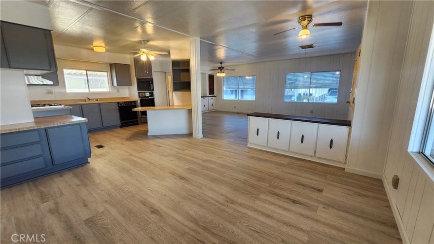 Charming Triple-Wide Mobile Home in Lancaster

Located in the heart of Lancaster, California, this spacious and beautifully updated mobile home offers comfort, convenience, and incredible potential. Recently freshly painted with brand-new flooring throughout, the interior features a bright and open living room, a welcoming dining area, and a functional kitchen ready for your personal touch.



With a total living space of approximately 1,514 sq. ft., this home includes a double-wide layout (56 ft x 24 ft) plus an additional side room (20 ft x 8 ft), making it a triple-wide and providing extra flexibility for a home office, guest room, or hobby space.



Situated in a well-maintained, peaceful park, this property benefits from low space rent and a prime location just minutes from shopping, dining, and essential services. It’s the perfect opportunity for buyers with a creative vision to transform this house into a warm and inviting family home.



This property is being sold “As Is”. Buyers are encouraged to verify all information to their satisfaction.