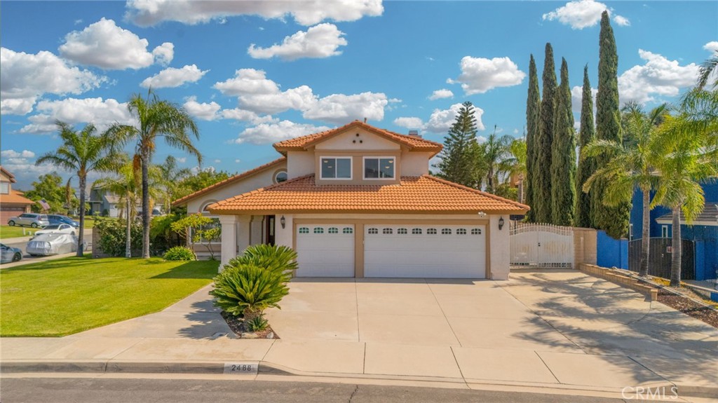 Absolutely Gorgeous!! This amazing two-story corner lot home is the epitome of turnkey. The home is nestled in the stellar foothills of Rialto in the highly coveted community of Las Colinas which provides relaxed style living and beautiful aesthetics. The curb side appeal of this home is phenomenal with its plush landscaping and attention to detail. The stunning backyard is huge, serene, and an entertainer's delight. It showcases a large gazebo with lights for the evening time, mature vegetation with stunning flowers, artificial grass for pets or golf, and a large patio cover. The backyard has room for a pool and spa, kids & pets to play, and parents to entertain and BBQ. The home is equally amazing and meticulously cared for. Pride of ownership permeates every facet of this house as it boasts many upgrades and amenities such as; bright and open floor plan, stunning luxury vinyl plank flooring & tile throughout, tall custom baseboards, recessed lighting, window treatments, huge open kitchen with custom quartz countertops and full backsplash, spacious full pantry, upgraded cabinets, stainless steel appliances, fireplace, tall ceilings & ceiling fans, full bedroom & bathroom downstairs with walk-in closet, large bedrooms with full closets, ideal primary bedroom with huge walk-in closet, custom primary European style walk in shower, tile encased soaking tub, 3 car garage, RV parking, and so much more. Words and pictures can never convey the beauty this home and community have to offer, come and see for yourself!!