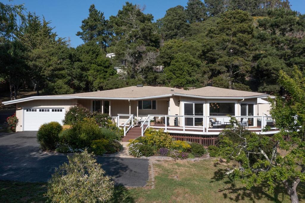 Stunning views, sun-drenched spaces, and ultimate privacy define this beautifully maintained 4-bed, 4-bath home with an office, offering over 2,500 sq ft of comfortable living. Set on 1.21 fully fenced, flat, and usable acres, this rare Mid-Valley gem invites you to grow, entertain, and unwind in a serene, spacious setting. An expansive deck seamlessly extends the living area outdoorsideal for gatherings under the sun or starlit skies. Bright interiors, a flexible floor plan, and a fantastic location just minutes from Carmel Valley Village and Carmel-by-the-Sea make this a unique opportunity. Come and see the possibilities