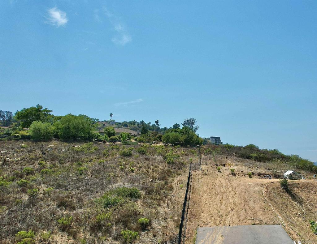 Discover the perfect canvas for your dream home with this 4.71-acre parcel in the beautiful community of Jamul. Offering a peaceful country feel while still being conveniently close to shopping, dining, and freeway access, this property strikes the ideal balance between privacy and accessibility. With Otay Water service available, you’ll save time and effort in bringing your vision to life. Imagine waking up to expansive mountain views, enjoying the wide-open space, and designing your property exactly the way you’ve always envisioned—whether that’s a custom estate, weekend retreat or serene retreat. The land’s generous size provides endless possibilities for home placement, outdoor living areas and more. Experience the charm of rural living without sacrificing modern convenience. Opportunities like this are rare—don’t miss the chance to make this special property yours. See attached maps