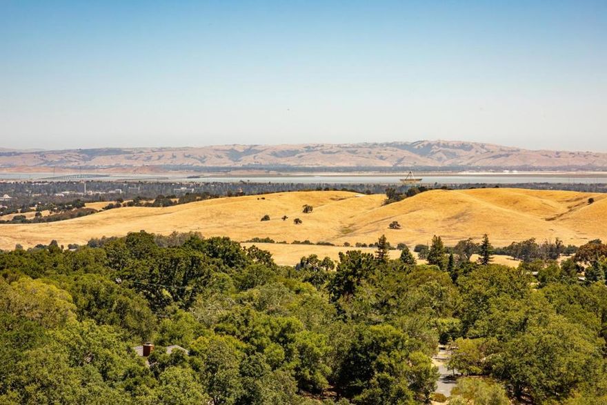 Commanding, panoramic views that must be seen in person photos can't do them justice! This is a rare opportunity to build new or reimagine the existing home with a full makeover, bringing natural views into every corner of your living space. Nearly every window frames the stunning beauty of the outdoors. Experience the very best of California living, with an expansive, ever-changing landscape/skyline unfolding before you. Situated on a 2-acre lot, this home offers 4 bedrooms, 2.5 bathrooms, and 2,380 square feet of living space. A once-in-a-lifetime opportunity to own a home in this coveted Portola Valley location.