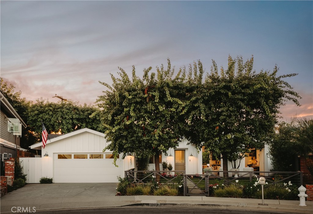 Located at the end of a quiet cul-de-sac in Eastside Costa Mesa, 223 Robin Hood Place is a modern, single-story retreat offering 4 bedrooms, 3.5 bathrooms, and 2,298 square feet of thoughtfully crafted living space. Rebuilt in 2011 by Cristiano Homes as a personal residence, this home blends clean lines, high-end finishes, and a seamless indoor-outdoor lifestyle. Lush, custom landscaping by Camille Beehler Design frames the inviting entry. Step inside to polished concrete floors, floating walls, and nine-foot ceilings filled with natural light from skylights and oversized sliders. The open-concept living area features vaulted 12-foot ceilings and connects effortlessly to both front and rear outdoor spaces. The gourmet kitchen, remodeled in 2021, showcases quartz countertops, a waterfall island, Miele and Dacor appliances, and a walk-in pantry. The primary suite includes a spa-like bath with soaking tub, dual-head shower, and direct access to a private hot tub. Outdoors, enjoy a built-in grill, fire pit, TV lounge, and pergola-covered dining area—ideal for entertaining or relaxing. Located minutes from Back Bay trails, top schools, and 17th Street’s shops and restaurants, this home offers comfort, privacy, and convenience in one exceptional package.
