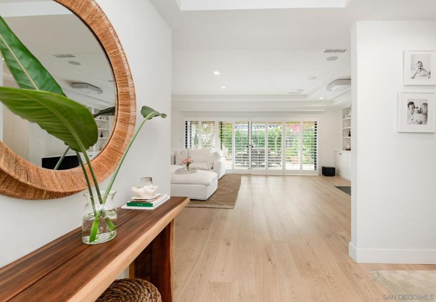 Completely Remodeled Single-Level Townhome in the Heart of Rancho Santa Fe Village!  Step into timeless elegance at 6163 Paseo Delicias, a single-story residence that has been completely reimagined from top to bottom with the finest materials and craftsmanship. Every detail has been thoughtfully designed to blend modern luxury with everyday comfort. Perfectly located within walking distance of the charming Rancho Santa Fe Village, you’ll enjoy easy access to boutique shops, fine dining restaurants, the historic Inn at Rancho Santa Fe, and cozy coffee spots. A scenic walking path across the street offers a serene way to enjoy the community, while the home itself sits in a peaceful setting with no traffic noise. Inside, expansive windows and skylights flood the interiors with natural light, creating an airy, inviting atmosphere. The open layout seamlessly connects to an expanded courtyard and private yard—perfect for indoor-outdoor living and entertaining.  Additional highlights include:  • A finished two-car garage with built-in functionality  • All utilities included for effortless living  • Designer finishes throughout with top-quality materials  • Privacy and tranquility in a prime Village location  This residence combines modern convenience with the charm and walkability of the Covenant, making it an ideal home for those seeking a turnkey lifestyle in Rancho Santa Fe.