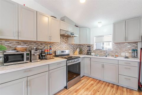 Photo of 7560 Woodman Place #65, Van Nuys, CA 91405 (MLS # SR25234285)