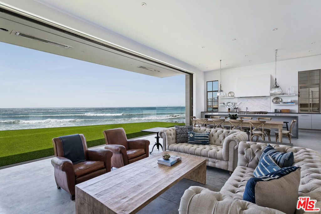 Stunning beach home on the world-famous Malibu Colony Beach, 66 ft of beach frontage with surf point break located directly out back. Sophisticated design by renowned architect Steve Giannetti, including an impressive great room with 12ft tall by 36ft wide walls of glass that disappear and open up to one of the largest and most dramatic beachfront decks in all of Malibu. Meticulous attention to detail throughout, designed for the most discerning clientele. All 5 bedrooms are en-suite and located on the second floor, the Primary + 2 additional bedrooms are oceanfront. Parking for up to 8 cars and close proximity to Malibu's top boutiques, shops, and restaurants. Summer pricing $250,000/mo.