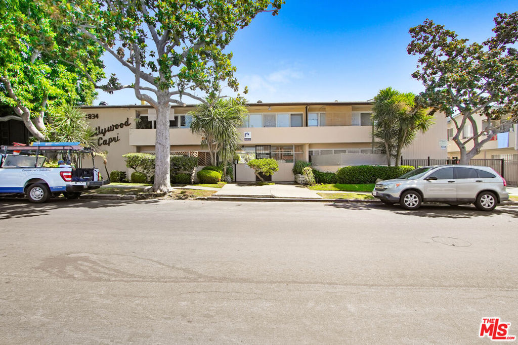The Hollywood Capri Apartments is a 23-unit courtyard apartment community located at 1834 North Harvard Blvd, in Los Angeles, CA 90027 (Los Feliz). The property is being offered for sale for the first time in over 40 years, providing investors with a rare opportunity to acquire an irreplaceable asset in one of LA's most dynamic neighborhoods. Built in 1955, 1834 North Harvard Blvd is a mid-century courtyard property with many period details. The 23 units surround a large open-air courtyard with a pool and seating areas for tenant enjoyment. In all, the property has 16,812 SF of improvements on an over-sized 20,501 SF parcel, zoned LAR3. North Harvard Blvd is a quiet, tree-lined street adjacent to Franklin Avenue and steps away from the Franklin Avenue corridor. Building amenities include intercom entry, gated parking for 15 vehicles, a large courtyard with gathering spaces / seating areas, and on-site laundry. An exceptional unit composition consists of two (2) 2 Bedroom/1 Bathroom units, one (1) Studio apartment, and twenty (20) 1 Bedroom/1 Bathroom apartment homes. All apartments are spacious, and select units feature floor-to-ceiling windows and additional upgrades, including new flooring, ceiling fans, and partially updated bathrooms and kitchens. Current ownership completed the mandatory soft-story retrofit in 2019, installed 210 feet of new guard rails in 2023, and installed gas shut-off valves in 2019. Resident parking is accessed through a private, gated driveway, offering 15 vehicle spaces, 10 covered parking spaces, and an additional 5 spaces located at the rear of the property. Electrical and gas utilities are separately metered and paid by residents.