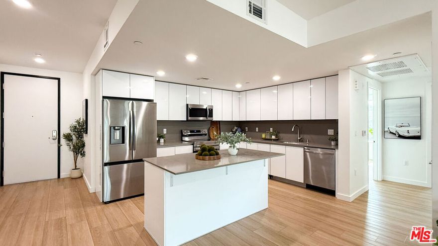 ** Move-In Special - 1 Month Free + $500 Look and Lease! ****.             Photos may be of a similar unit. Finishes are consistent throughout; layouts and patio sizes may vary*She had curves in all the right places, the kind that catch the light just so when the sun hits Sunset Blvd.Her name? Sophia.Tucked in the beating heart of Hollywood, The Sophia is a 28-unit building where the elegance of 1930s architecture dances with the polish of modern design. Built in 2023 but born of a bygone era, her deco-inspired faade glows under the California moonlight  beckoning creatives, dreamers, and dealmakers home.Inside, the lines are clean, the finishes sharp. Spacious open floor plans flow into sleek, high-gloss kitchens outfitted with stainless steel appliances, smooth quartz counters, and minimalist cabinetry. Some units include center islands  just the place to pour a nightcap or hash out a third-act twist. Floor-to-ceiling sliders open wide onto massive private decks, perfect for morning espresso or twilight scripts. And if you're lucky? Your view includes Capitol Records, the Hollywood Sign, and the glittering skyline of your next chapter.Each unit offers bright bedrooms, generous closets, and bathrooms with modern vanities and marble-style tile that whispers luxury without shouting it. Throughout, pale wide-plank floors keep things grounded while natural light steals the scene.Downstairs, off the lobby, the Writer's Lounge offers velvet chairs and a library curated for inspiration  it's where screenplays are born and ideas linger in the air like perfume, smoky, romantic, and full of story. There's also a fitness center, bike storage, and two-car parking (a true LA love letter). Highlights Include:*Massive private decks with views of Capitol Records & Hollywood Sign (select units)*Sleek kitchens with upgraded stainless steel appliances*Spacious open layouts and large closets*Writer's Lounge with curated library*Gym, bike storage, and parking for two*Built in 2024 with Art Deco-inspired design*Pet friendly, because of course she is. The Sophia isn't just an address. She's a mood. A lifestyle. A story in motion. Hollywood rewards the bold. Book a tour, walk the deck, feel the sun, and fall for Sophia.