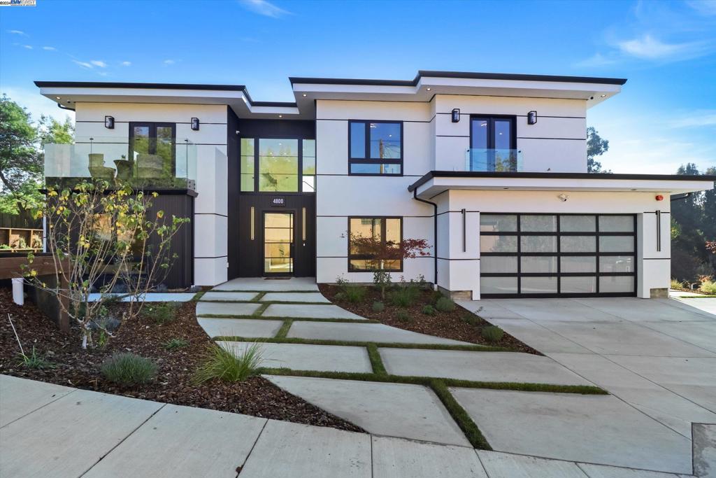 Exquisitely crafted Castro Valley masterpiece. This modern oasis spans over two levels featuring an open floor plan with four bedrooms, four and half bathrooms, ample natural light, and countless designer touches throughout. On the main level you will find a gourmet chef's kitchen with high-end appliances by Thermador, glass walk-in wine cellar, dining room, living room with fireplace, a library, large guest bedroom with en suite bathroom, powder room, foyer, and garage access. The upper level boasts a generous master suite with two walk-in closets, large bathroom with freestanding tub, and a balcony. Two additional bedrooms with en suite bathrooms, a family room with large balcony, an office, and laundry area are also located on the same level. An expansive and professionally landscaped yard completes this immaculate home.