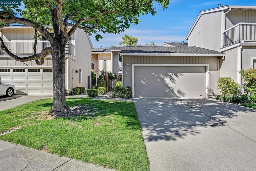 Welcome to this beautifully updated 3-bedroom, 2.5-bath townhouse located in the peaceful Quail Ridge community of Walnut Creek. With soaring vaulted ceilings, fresh updates throughout, and picturesque pond views, this home offers comfort, style, and charm. Inside, you'll find all-new paint, new light fixtures, and brand-new flooring. The updated kitchen is both functional and stylish, with easy access to the dining room and a large living room featuring a dramatic vaulted brick fireplace. Both the living and dining rooms open to the back deck, where you’ll enjoy tranquil views of the pond and nearby walking paths. Upstairs, you will find two spacious bedrooms including a primary suite with high ceilings, a second en suite, and an airy loft—perfect as a home office, den, or easily converted into a third bedroom. The private front courtyard is ideal for entertaining and connects directly to a generously sized two-car garage. Situated just minutes from downtown Walnut Creek, BART, shopping, and top-rated schools, this move-in ready townhouse is a rare blend of tasteful updates and natural serenity.