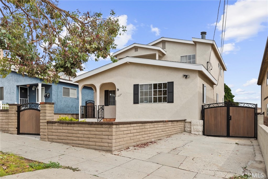 Perched in the heart of Coastal San Pedro, this spacious single-family home blends classic beach city living with modern updates and everyday convenience. Enjoy the coastal ambiance by day and take in sweeping views of the city and harbor lights by night.
The home offers 3 bedrooms and 3 full bathrooms, plus a dedicated half bathroom and bonus room in the basement. The main living area is centered around a cozy fireplace, while the primary suite features its own private fireplace for added comfort and warmth. The custom built-in office/bonus room in the basement provides the perfect space for remote work or additional living.
Recent upgrades include a newer HVAC system (2024), a newer roof (2024), fresh interior paint, and timeless wood flooring throughout the home - with tile flooring in the bathrooms. Appliances include a gas range and dishwasher.
Parking is also a breeze with driveway access, a rear carport, and a Tesla charger already installed!
Just minutes from San Pedro’s vibrant waterfront, you’ll have access to the upcoming West Harbor waterfront development, Cabrillo Beach, and the historic Point Fermin Lighthouse. With coastal breezes, neighborhood charm, and modern conveniences, this home offers a unique opportunity to live in one of the South Bay’s most historic and up-and-coming communities.