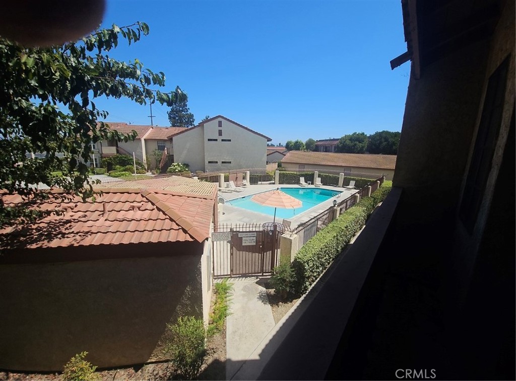 Spacious upstairs 3 bedrooms, 2 baths single - level condo. Recessed lights throughout the home. Large kitchen with Granite countertops, range, microwave and dishwasher. This property overlooks the pool and spa area. Two car detached garage with opener. Living room has a fireplace and cathedral ceilings, creating a very relaxing feeling. Large balcony area off the living and dining rooms. A second balcony at the primary bedroom. Complex is located at the corner of Crescent and Magnolia. Close to schools, shopping and freeways.