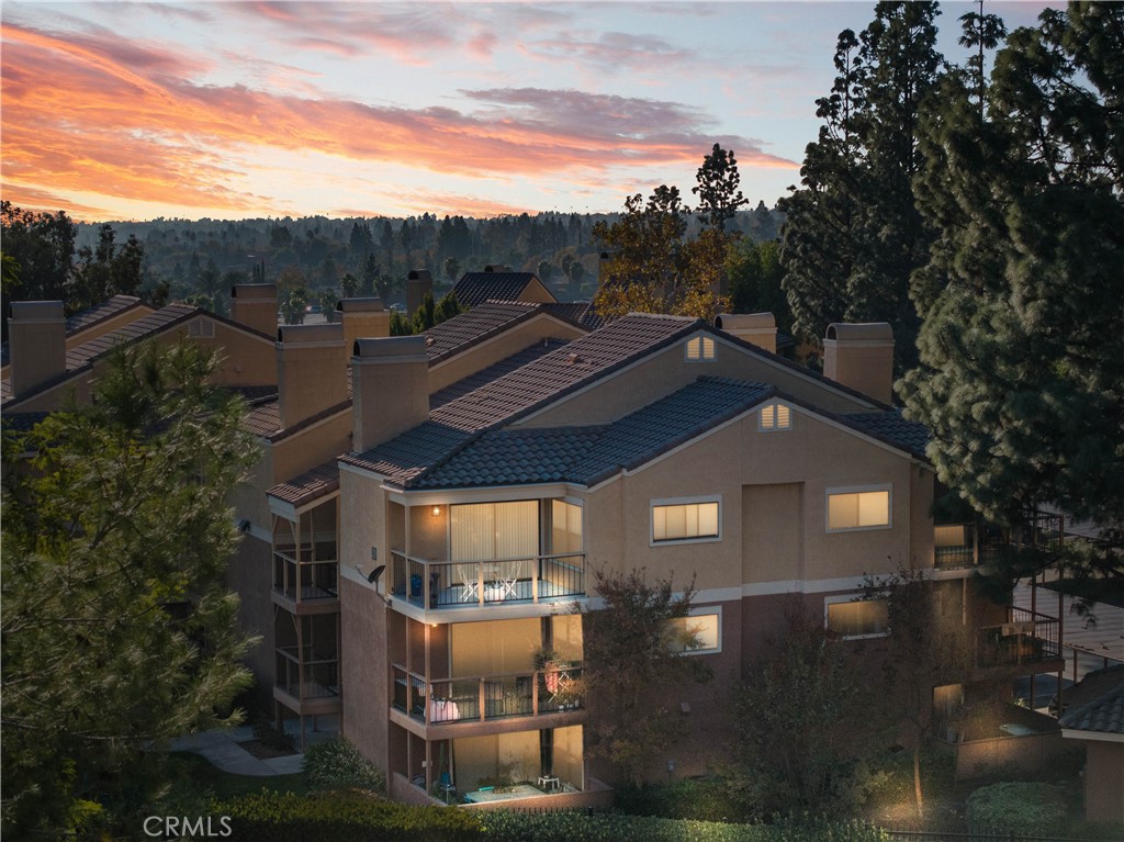 Move-in ready 1-bedroom, 1-bath condo with new flooring, open layout, and a private balcony with a scenic view. Assigned parking is conveniently located right outside the unit. Enjoy community amenities including a pool and tennis court. Just minutes from Trader Joe’s, shopping, and the freeway—ideal for comfort and convenience!