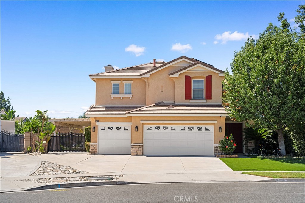 PRIME RANCHO CUCAMONGA RENTAL OPPORTUNITY! RV Parking! This beautifully maintained single-family home features 4 bedrooms and 2.5 bathrooms in the highly desirable Vintage Park Lane community. The open floor plan boasts new luxury vinyl flooring throughout the main living areas, a gourmet kitchen with stainless steel appliances and granite countertops, and a spacious primary suite with walk-in closet. Enjoy California indoor-outdoor living with a private backyard featuring a covered patio and low-maintenance landscaping. The property includes a 3-car garage and is situated on a quiet corner lot. This large lot is truly an entertainer's dream! Lime, orange, tangerine, lemon, avocado, and Japanese Maple trees are a few of the delightful aspects of this awesome space! Treat yourself to some quiet time with tranquil sounds from the pond or watch the Big Game under the shade of the covered patio while serving up drinks and dinner from your built-in wet bar area. Located within the acclaimed Etiwanda School District, and just minutes from Victoria Gardens shopping center, daily conveniences, and easy freeway access (15/210). Available for immediate move-in with competitive rental terms. Perfect for families seeking luxury living in one of Rancho Cucamonga's most sought-after neighborhoods!