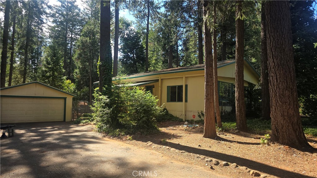 Charming, Remodeled Home in a Peaceful Neighborhood Setting! Step inside to a freshly updated interior featuring all-new laminate flooring and fresh paint throughout. The open-concept living room flows seamlessly into the dining area, complete with a built-in hutch and large front windows that frame views of the lush greenery and mature trees outside. Enjoy the ease of single-level living on a beautifully level lot, complete with a 2-car garage, fenced backyard, and fruit trees gracing the front yard. The spacious primary bedroom offers a walk-in style closet, a dedicated vanity/dressing area, and a private en-suite bathroom with a full tub and shower. The guest bedroom and adjacent full bath provide comfort and convenience for family or visitors.
Located in a quiet, friendly neighborhood just blocks from the local elementary school and minutes from shopping, dining, and the post office. Outdoor lovers will appreciate the short drive to fishing at Lake DeSabla or Paradise Lake, as well as nearby hiking and biking trails. For full recreational access including boating and swimming, Lake Oroville is just a quick trip away!