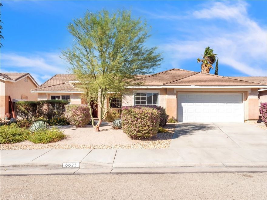 Rare Find! This beautifully maintained single-story home offers 4 spacious bedrooms plus a versatile bonus room - perfect for a large family, first-time buyers, or savvy investors. Enjoy fresh interior paint, upgraded landscaping, and a layout designed for comfort and functionality. Features include durable laminate and tile flooring, a tile roof, and a covered patio ideal for year-round gatherings. With thoughtful updates and pride of ownership throughout, this home is move-in ready and full of potential. Don't miss your chance to own this exceptional property - schedule your private showing today