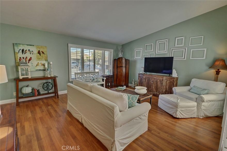 Beautiful, single story, move-in ready unit in the beautiful, resort style community of Huntington Beach Landmark, ready for a new owner! This unit has been meticulously upgraded and maintained by the previous owner showing upgraded kitchen and bathroom cabinets, granite countertops, vinyl wood flooring in living spaces with porcelain flooring in kitchen and bathrooms. Additionally this unit comes with air conditioning for those hot days along with beautiful plantation shutters that elegantly controls lighting to each room! This 55+ development might be one of the top in the country with it's wide streets, mature tall trees, green belts, 2 heated pools, spa, tennis and pickle ball courts, putting green, billiards, gym, wood shop, shuffle board and it's just a short walk to the beach! 24/7 gate guarded and RV storage available for a small fee to owners.