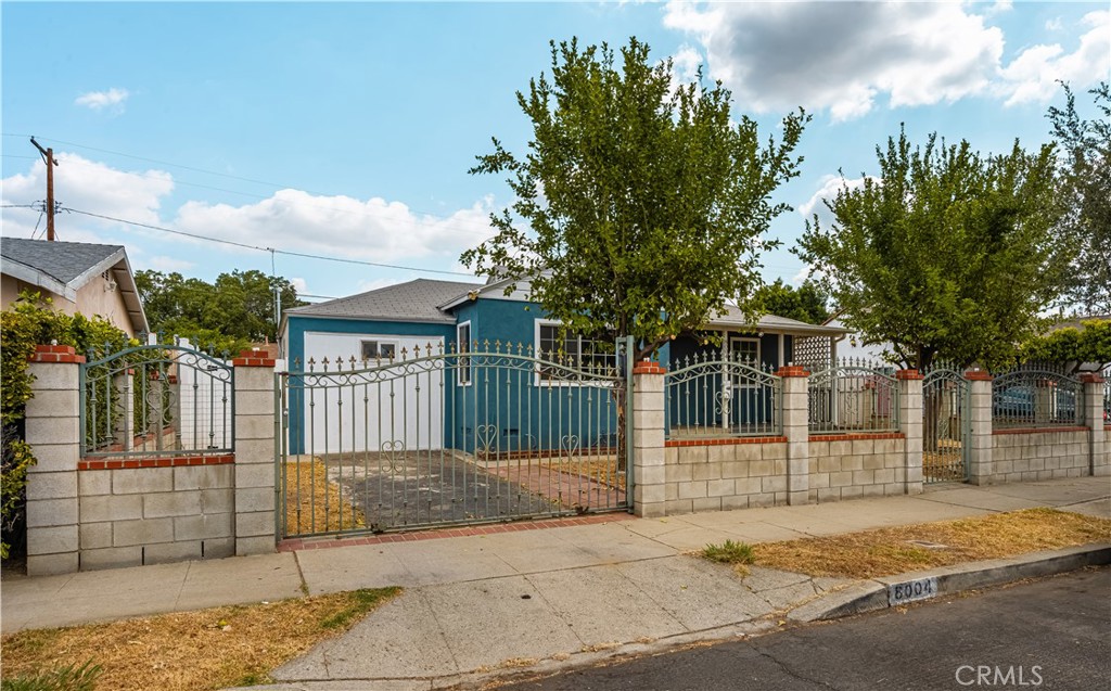 Welcome to this charming 3-bedroom, 2-bath home featuring move-in ready upgrades, including stylish flooring and a modern kitchen. The spacious lot offers a versatile backyard area, with a bonus structure perfect for an art studio, home office, or playroom. Nestled on a welcoming tree-lined street, this well-priced property is full of potential—come see it while it lasts! The garage has been thoughtfully converted and is included in the official bed and bath count, adding valuable living space.