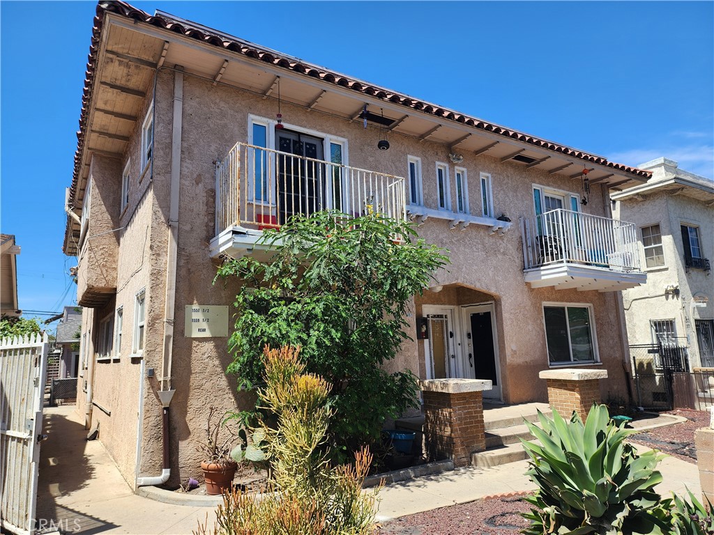 6-unit building located at 1557 Pine Avenue consists of three buildings: a fourplex, a freestanding house, and a rear building with a single unit above four single-car garages. The front fourplex is comprised of (2) one-bed/one-bath and (2) two-bed/one-bath units. The freestanding house is a two-bed/one-bath. All of the units are separately metered for gas and electricity.