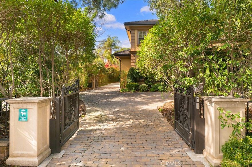 Welcome to this French Chateau nestled in the most prestigious Arcadia neighborhood, where timeless elegance meets modern luxury.  From the moment you enter through the wrought-iron gates into a peaceful Courtyard that showcases the extraordinary scale of this lovely home. With almost ~11,000 sqft of Luxury Living Area in an almost ~30,000 sqft Flat Lot, a voluminous atmosphere awaits, with a dramatic 28 feet soaring Foyer and a Double Staircases plus a unique grand Living Room of same soaring Ceiling. Highlights of this French Mansion include 7 generous bedrooms, 9 bathrooms, a stunning living room, a chef's kitchen adjacent to the beautiful Family Room, a gorgeous Dining Room and an inviting Library/Office plus a Pool House. The primary Master Suite upstairs features Marble Fireplace, Sitting Area, Dual Closets and Bathrooms that lead to the private Patio and Private Staircase directly accessing to the beautiful Backyard.  The picture perfect Backyard with an expansive Outdoor Terrace, views of the Pool & Spa, and perfectly manicured Gardens.  Step outside to your own private oasis, where an exotic backyard invites you to relax and entertain. The pristine Pool and Spa are complemented by a top-of-the-line outdoor BBQ area, creating the stunning setting for unforgettable gatherings. With ample space for alfresco Dining and Entertaining, this Backyard is a true Retreat, offering an unparalleled Southern California lifestyle in the heart of the most popular city in Southern California.  This extraordinary property provides a peaceful and private sanctuary to experience ultimate Luxury Living in one of the most desirable neighborhoods, surrounded by the most coveted world-class Dining, Santa Anita Shopping Mall, the Race Track plus the Arcadia Awarded Winning Blue Ribbon School District.